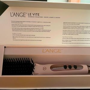 L’ange hair brush straighter. Used once. Great hair tool